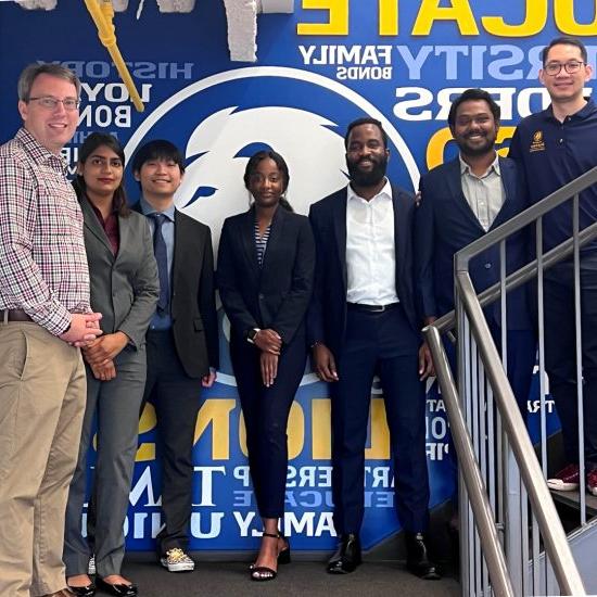 Students and faculty posing for a picture